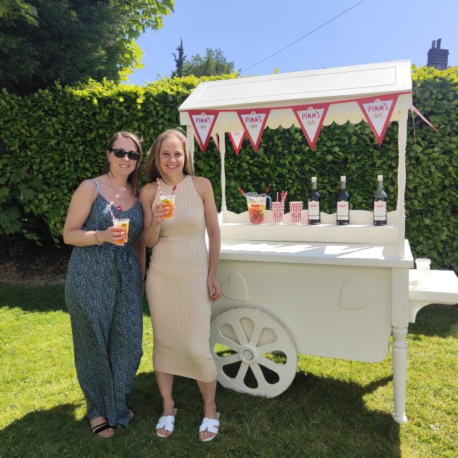 People Enjoying the Pimms cart summer drinks