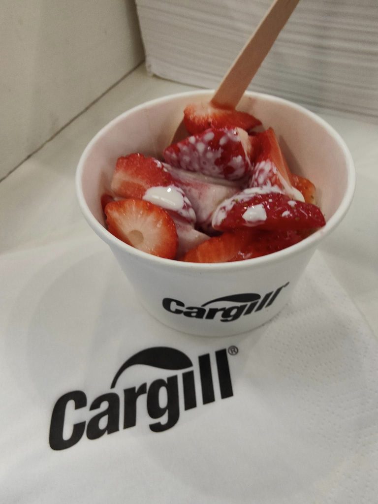 Branded strawberries and cream tub for a corporate event